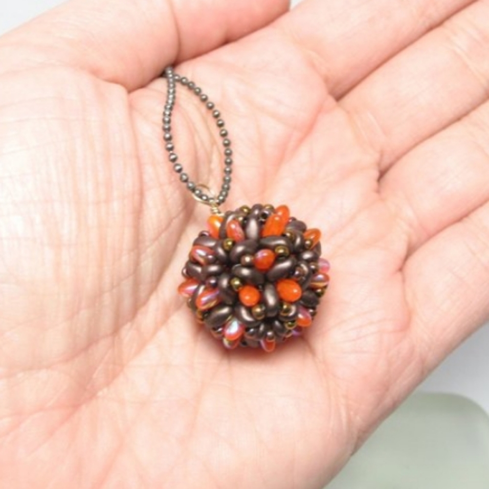 Handwoven beaded bead pendant